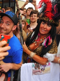 Alan Partridge and I Zulu warrior at his Alpha Papa Norwich film premiere July 2013